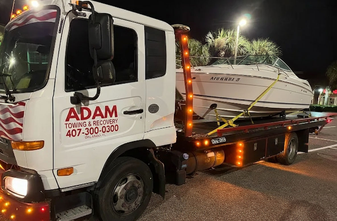 Boat Towing Service By Adam Towing & Recovery in Sand Lake, FL