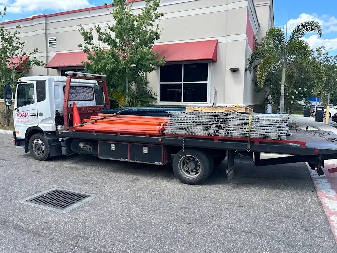 Construction Equipment Towing Service By Adam Towing & Recovery in Sand Lake, FL